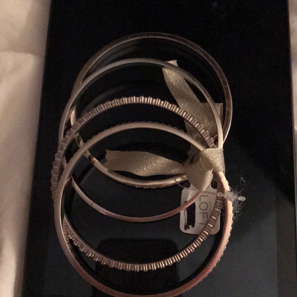 4 silver bangles